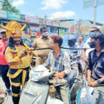 PorurTraffic police disguised as Etherman, raising public awareness about helmets-1 (2)