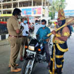 PorurTraffic police disguised as Etherman, raising public awareness about helmets-2 (2)