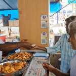 DMK members celebrated the 70th birthday of Tamil Nadu Chief Minister M. K. Sthal by giving biscuits and samsa to the public at Kumbakonam’s Palagam-p2