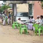 National Investigation Agency police gather in front of his father’s dead house to arrest the person wanted in the murder case -p1