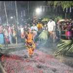 Despite the pouring rain, the 8th annual Dimithi festival of Arulmiku Sri Ponniyamman Temple was held in Periyamullaivayal village..
