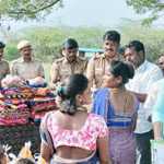 Meenjur police station distributed flood relief kits containing essential items to more than 150 tribal families-p1