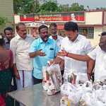 Minister Anbil Mahesh Poiyamozhi gave a package containing flood relief items to the transgenders living in Athipattu Pudunagar area-p1