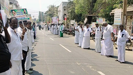 AIADMK organized a human chain protest across Mayiladuthurai district...p