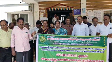 The revenue department officials involved in protest protest insisting on the ten-point demand..