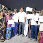 A program was held in Meenjur Arunodaya Nagar where the tribal people gave 17 fishermen welfare identity cards-p