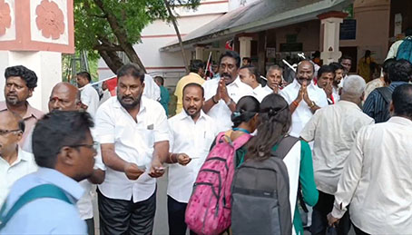 AIADMK's former minister V. Somasundaram, who was actively involved in collecting votes for the double leaf symbol from train passengers in Kanchipuram...p